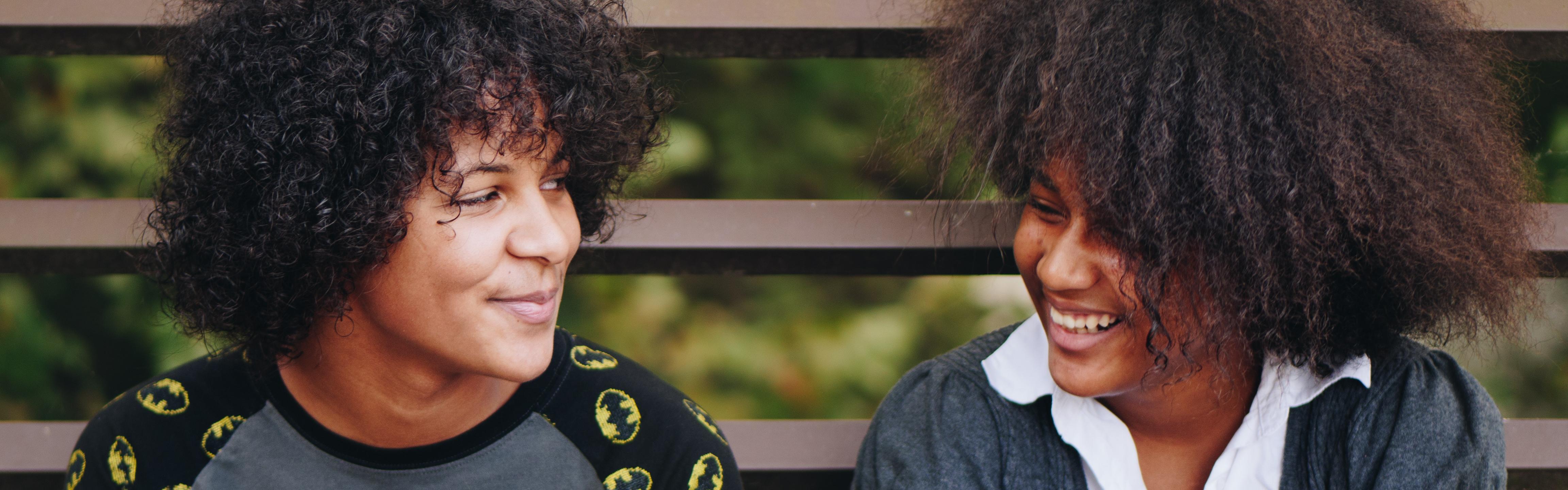 Two sisters smiling
